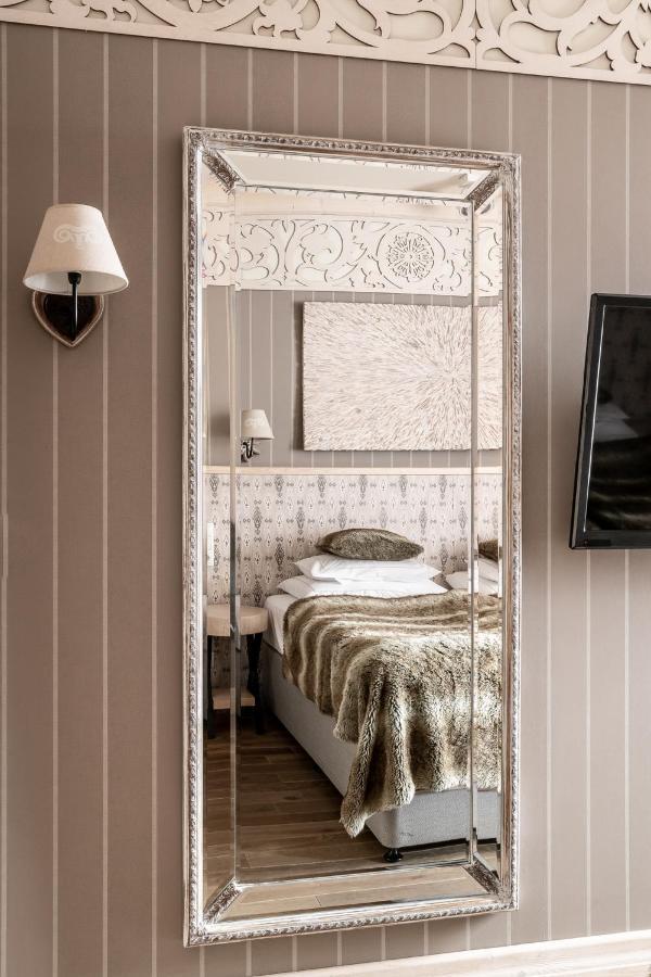 Aries Hotel & Spa Zakopane Luaran gambar A mirror